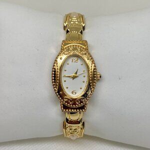 Geneva women’s gold tone watch 20mm oval quartz analog cuff bracelet 7” running